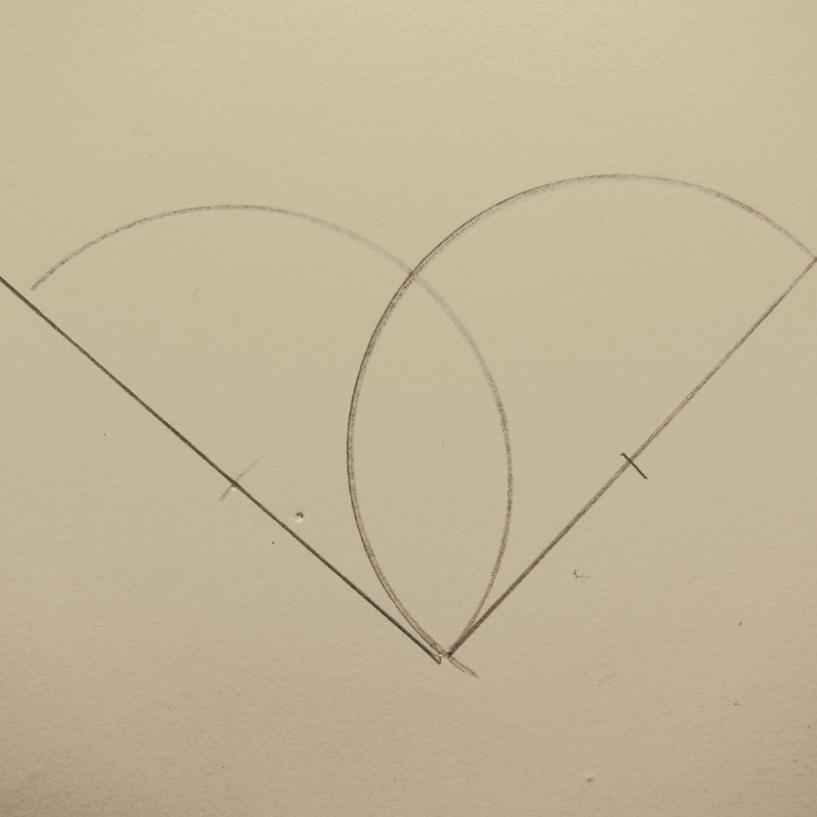 Hjerte konstruert av to halvsirkler som overlapper hveransre.