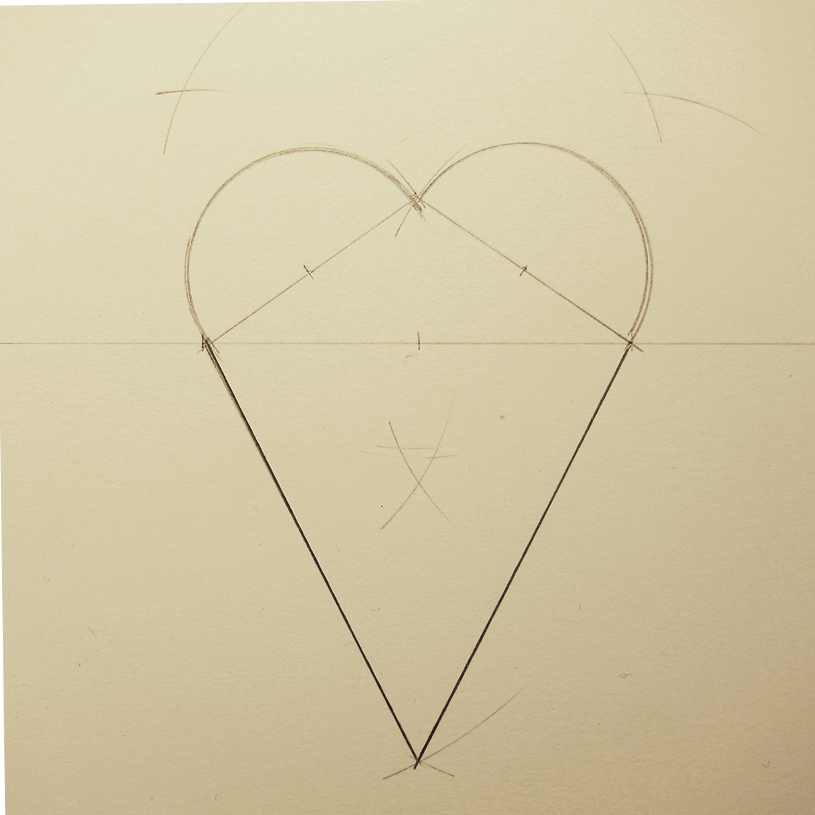 Hjerte konstruert av to likebeinte trekanter og to halvsirkler.