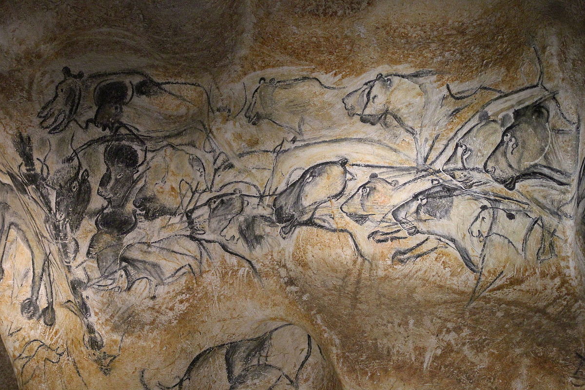 Hulemaleri av løver og bison fra Chauvet-hulen i Frankrike.